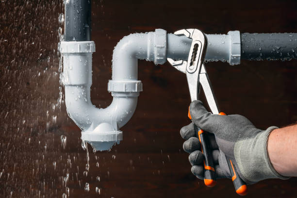 Professional Plumbing technician working in Russell, IL